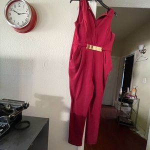 Red romper with gold belt